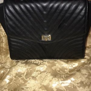 Gently used black leather handbag